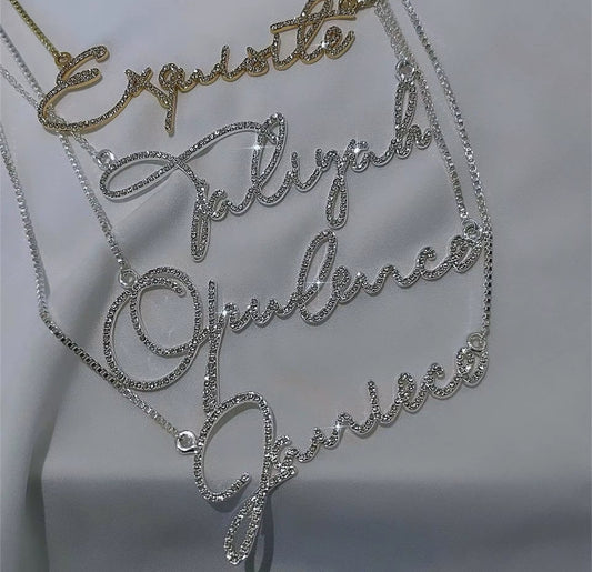 Custom rhinestone name necklaces in silver and gold script 
